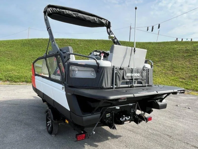 Slide: The Image of 2024 Sea-Doo SWITCH SPORT 18' 230HP boat on trailer, rear view. - 5