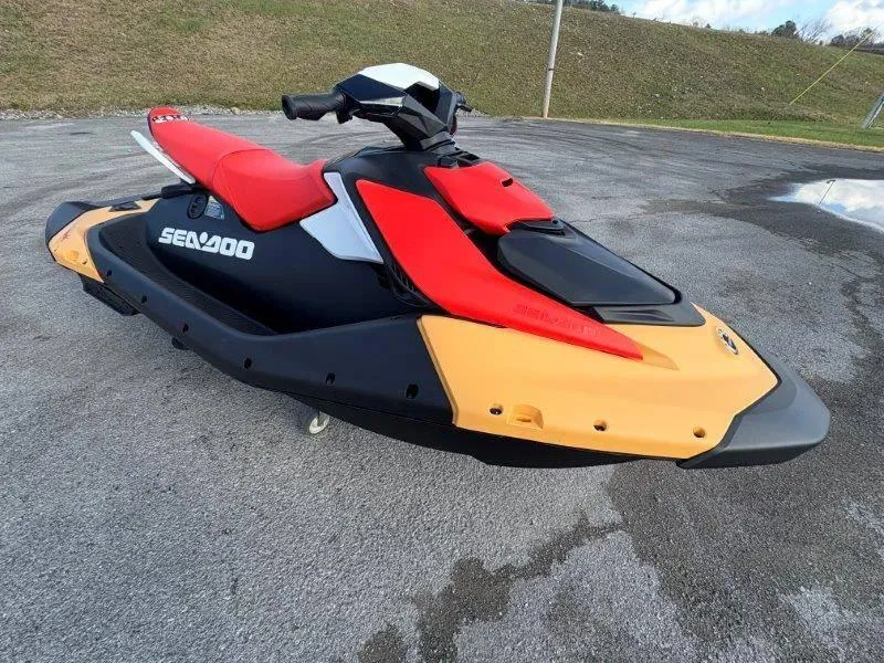 Slide: The Image of 2024 Sea-Doo Spark for 3 Rotax 900 ACE-90 with iBR, vibrant red and yellow design. - 1