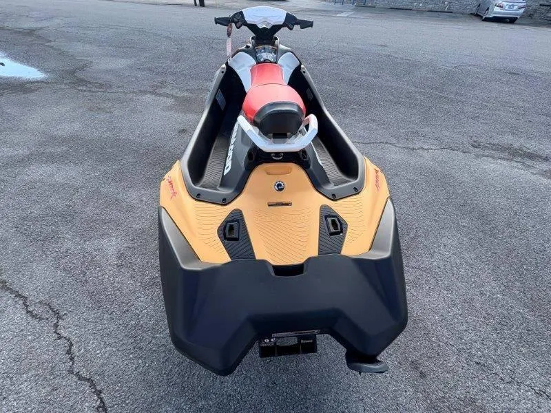 Slide: The Image of 2024 Sea-Doo Spark for 3 Rotax 900 ACE-90 with iBR, rear view on pavement. - 19