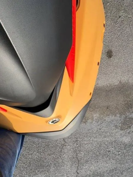 Slide: The Image of 2024 Sea-Doo Spark for 3 Rotax 900 ACE-90, close-up view, orange and black design. - 21