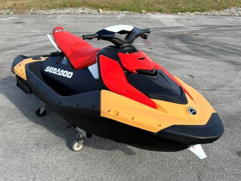 Slide: The Image of 2024 Sea-Doo Spark for 3 Rotax 900 ACE-90 with iBR, vibrant red and yellow design. - 30