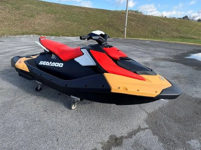 Slide: The Image of 2024 Sea-Doo Spark for 3 Rotax 900 ACE-90 with iBR, vibrant red and yellow design. - 32