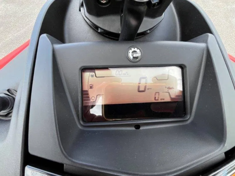 Slide: The Image of Close-up of 2024 Sea-Doo Spark Trixx dashboard display, showing speed and fuel indicators. - 14
