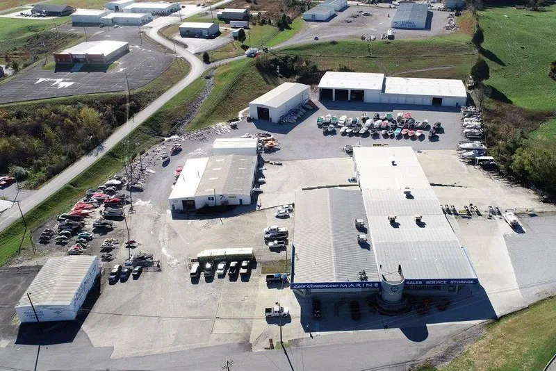 Slide: The Image of Aerial view of a marine dealership showcasing various boats and equipment, including 2024 Sea-Doo models. - 8