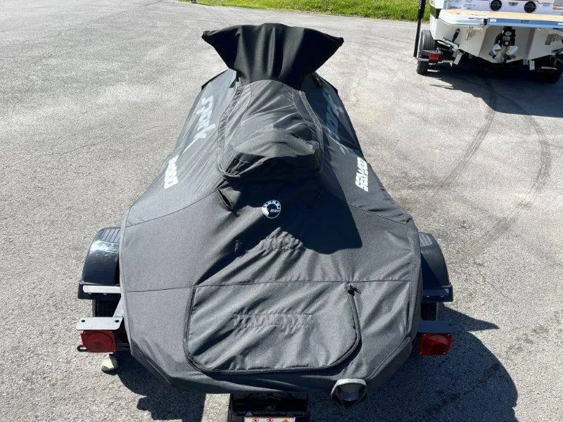 Slide: The Image of 2022 Sea-Doo Spark Trixx 3 Up Sound covered on trailer. - 28
