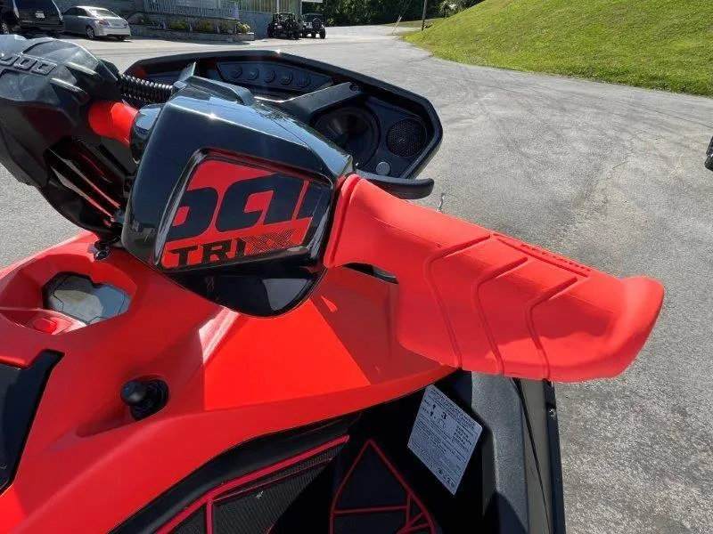 Slide: The Image of 2022 Sea-Doo Spark Trixx 3 Up Sound, vibrant red handlebar detail. - 38