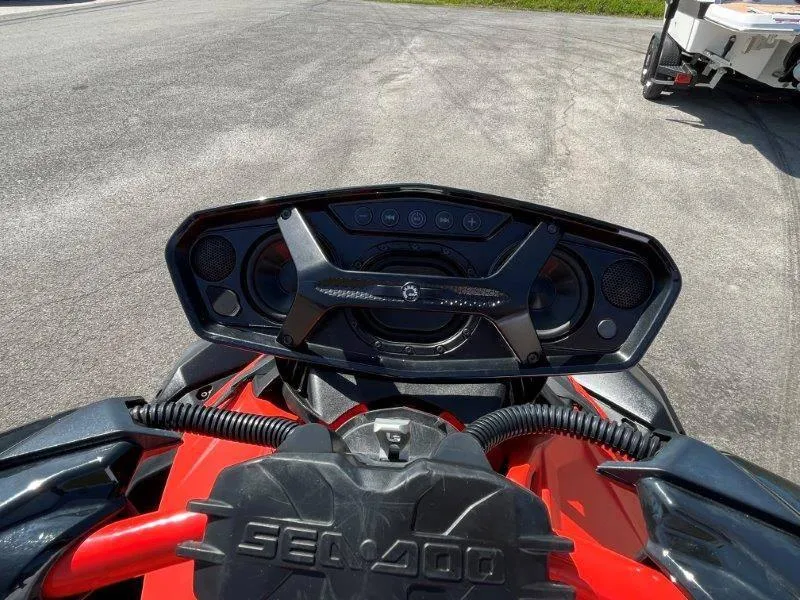 Slide: The Image of 2022 Sea-Doo Spark Trixx 3 Up Sound dashboard view, featuring control panel and speakers. - 39