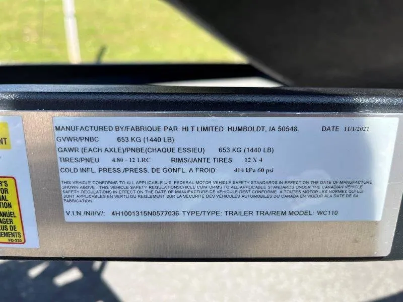 Slide: The Image of Label on Sea-Doo Spark Trixx 3 Up Sound trailer, detailing specifications and compliance information. - 40