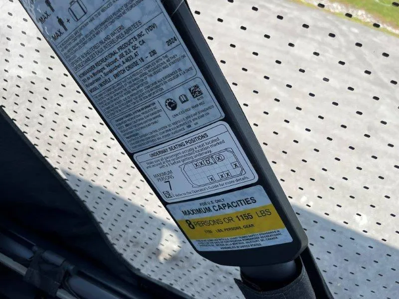 Slide: The Image of Capacity label on 2024 Sea-Doo Switch Cruise 18' 230hp, seating and weight limits. - 18