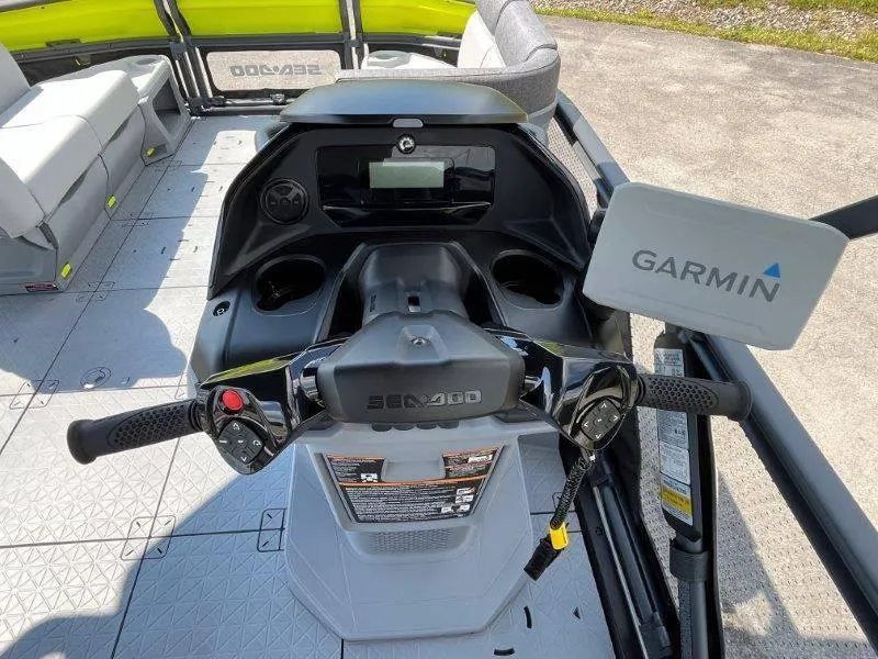 Slide: The Image of 2024 Sea-Doo Switch Cruise 18' 230hp dashboard with Garmin navigation system. - 19
