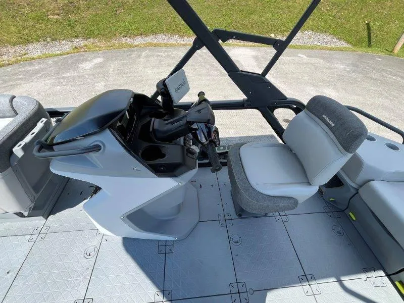 Slide: The Image of 2024 Sea-Doo Switch Cruise 18' 230hp cockpit with steering and seating. - 25