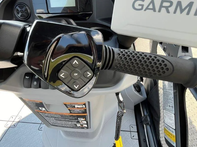 Slide: The Image of 2024 Sea-Doo Switch Cruise 18' 230hp dashboard with Garmin navigation system. - 27