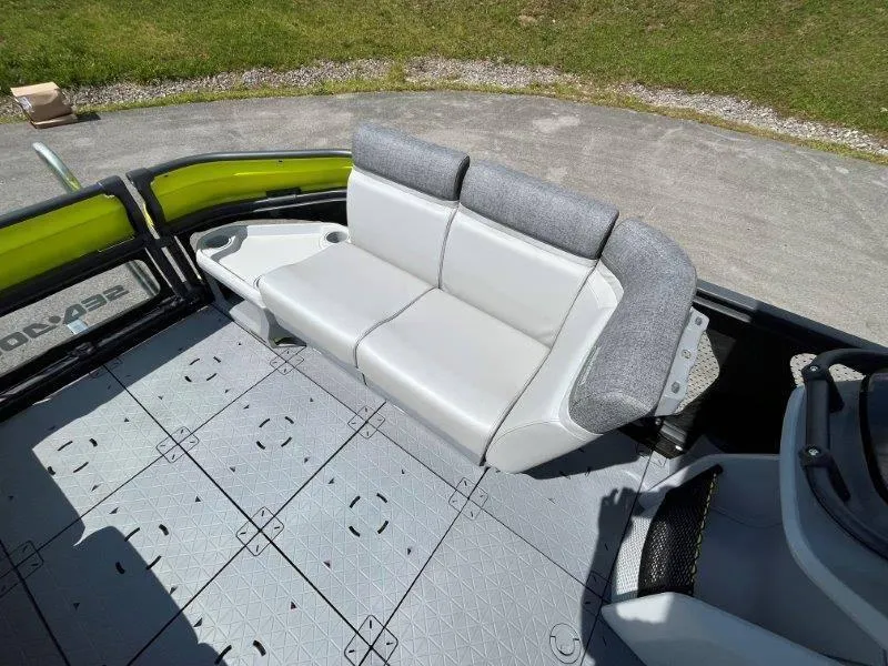 Slide: The Image of 2024 Sea-Doo Switch Cruise 18' interior with gray seating and modular flooring. - 28