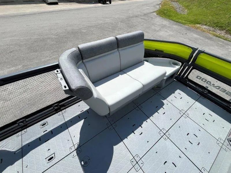 Slide: The Image of 2024 Sea-Doo Switch Cruise 18' 230hp boat interior with gray seating and spacious deck. - 31