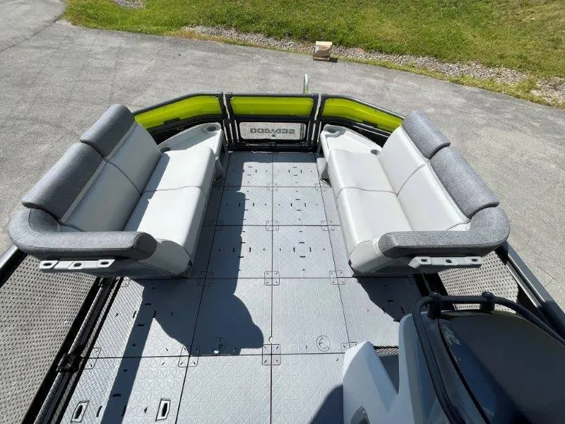 Slide: The Image of 2024 Sea-Doo Switch Cruise 18' 230hp interior with spacious seating and modern design. - 35