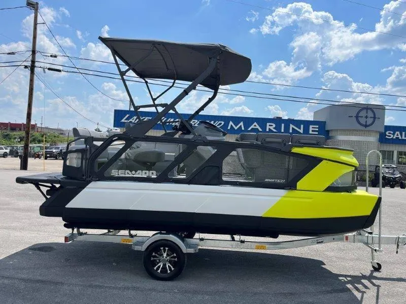 Slide: The Image of 2024 Sea-Doo Switch Cruise 18' 230hp boat on trailer at dealership. - 5