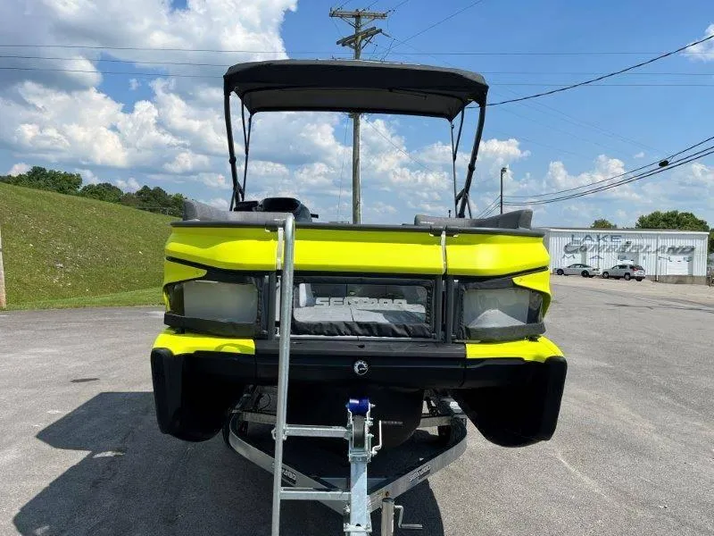 Slide: The Image of 2024 Sea-Doo Switch Cruise 18' 230hp on trailer, vibrant yellow, parked outdoors. - 8