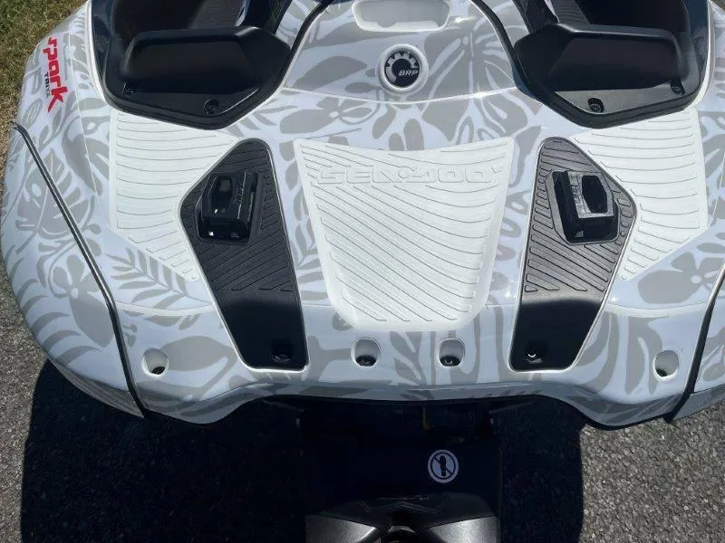 Slide: The Image of 2024 Sea-Doo Spark 1UP Trixx 90 Sound, top view, floral pattern design. - 11