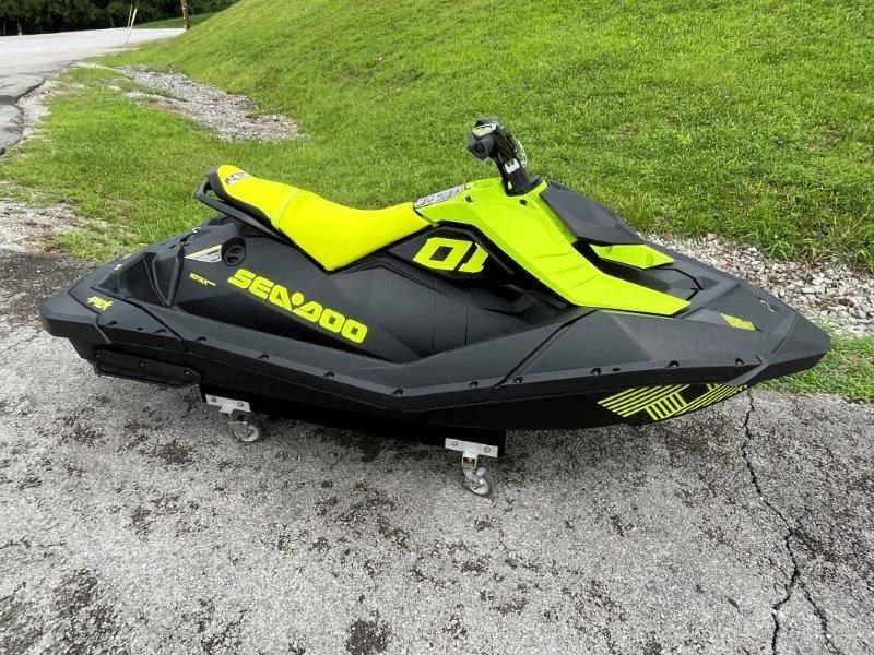 Slide: The Image of 2023 Sea-Doo SPARK TRIXX 2up jet ski in vibrant yellow and black. - 31