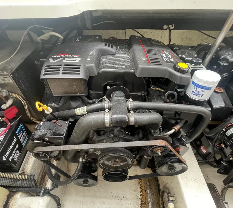 Slide: The Image of 1999 Formula 34 PC engine compartment with V6 engine and components. - 26