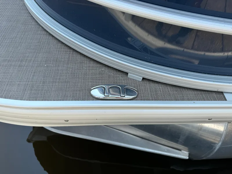 Slide: The Image of 2020 Sun Tracker Party Barge 22 Tri Toon RF XP3, close-up of deck detail. - 10