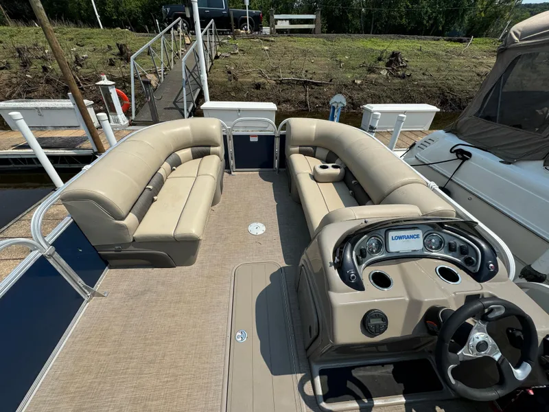Slide: The Image of 2020 Sun Tracker Party Barge 22 Tri Toon RF XP3 with spacious seating and modern dashboard. - 14