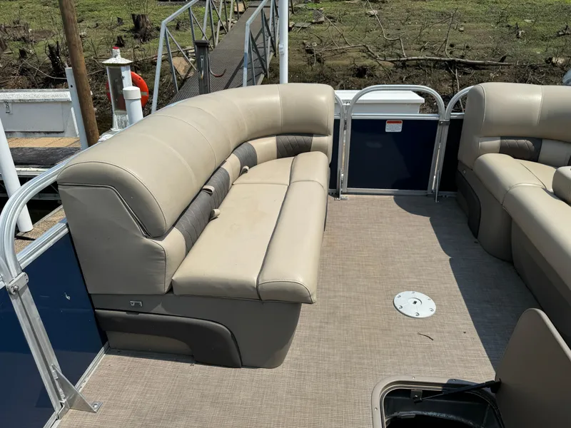 Slide: The Image of 2020 Sun Tracker Party Barge 22 Tri Toon RF XP3 with beige seating and spacious deck. - 22
