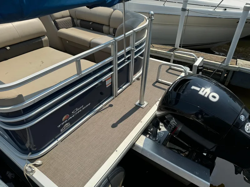Slide: The Image of 2020 Sun Tracker Party Barge 22 Tri Toon RF XP3 with seating and motor at dock. - 5