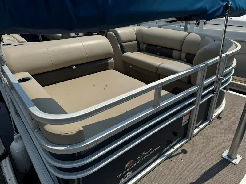 Slide: The Image of 2020 Sun Tracker Party Barge 22 Tri Toon RF XP3 with beige seating and blue canopy. - 6