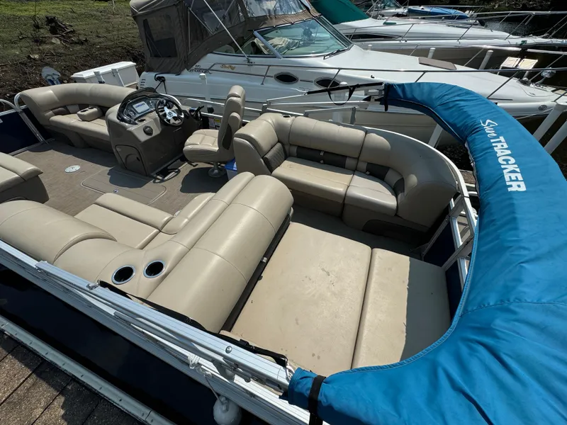 Slide: The Image of 2020 Sun Tracker Party Barge 22 Tri Toon RF XP3 with beige seating and blue cover. - 7