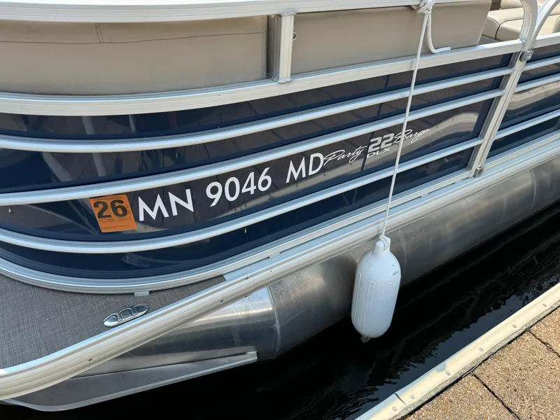 Slide: The Image of 2020 Sun Tracker Party Barge 22 Tri Toon RF XP3 docked with registration number MN 9046 MD. - 9