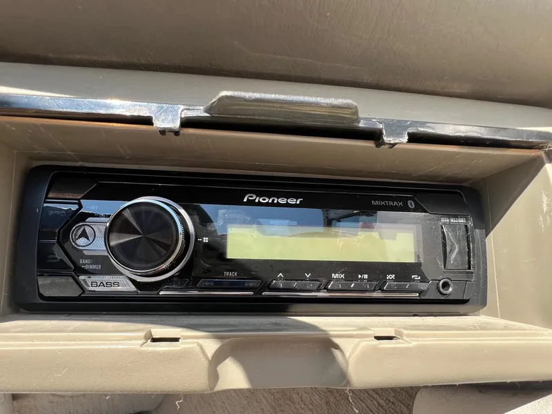 Slide: The Image of Pioneer Mixtrax stereo in a 2001 Crownline 192 BR boat dashboard. - 11