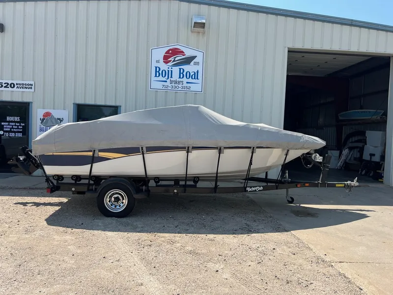 Slide: The Image of Covered 2001 Crownline 192 BR boat on trailer outside Boji Boat Brokers. - 20