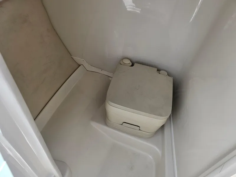 Slide: The Image of Portable toilet inside 2007 Monterey 220 EX boat compartment. - 20
