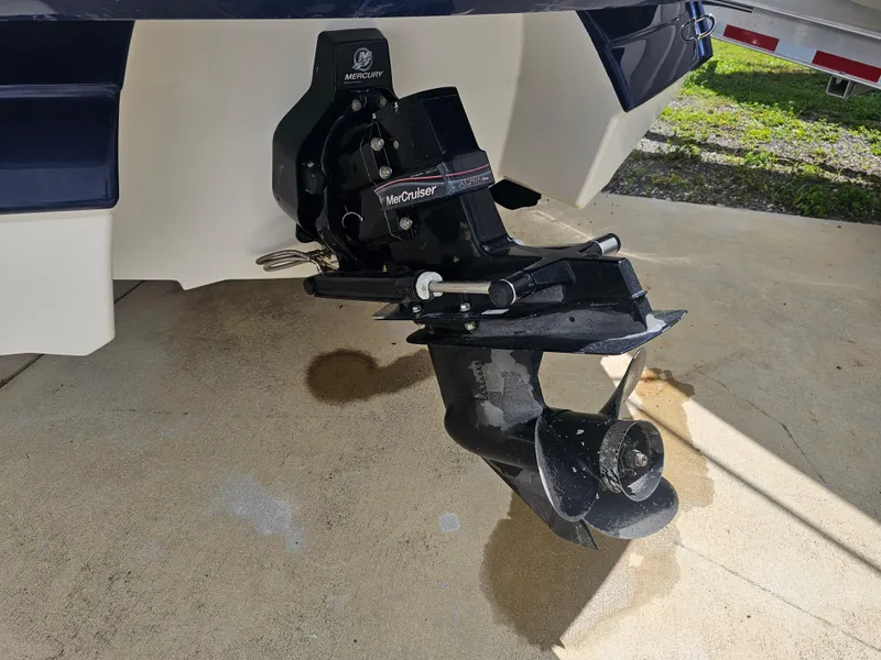 Slide: The Image of 2007 Monterey 220 EX boat with MerCruiser outdrive on a concrete surface. - 23