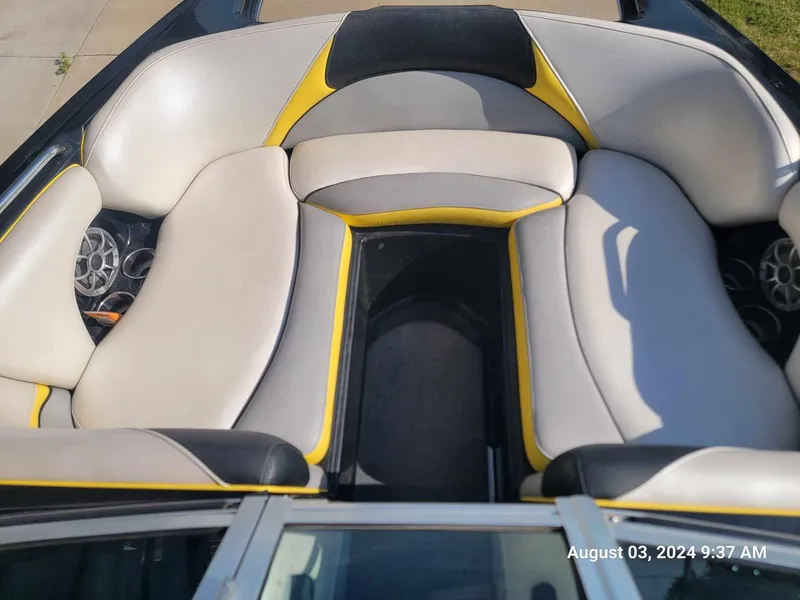 Slide: The Image of Interior of 2013 MB F21 Tomcat boat with gray and yellow seating. - 12