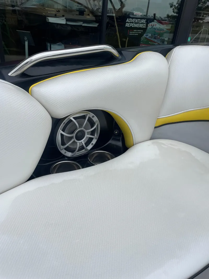 Slide: The Image of White and yellow boat seat with speaker, 2013 MB F21 Tomcat model. - 19