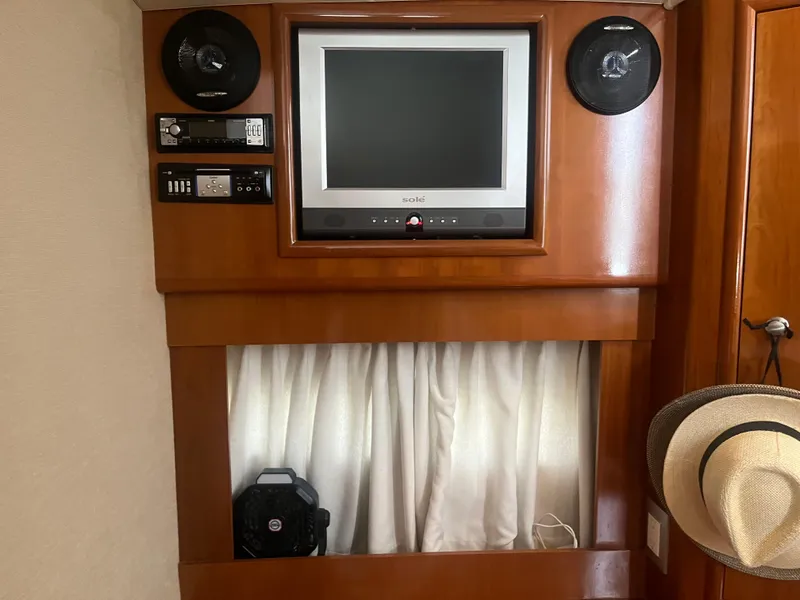 Slide: The Image of Entertainment system in 2006 Carver 430 Cockpit Motor Yacht with TV and speakers. - 29