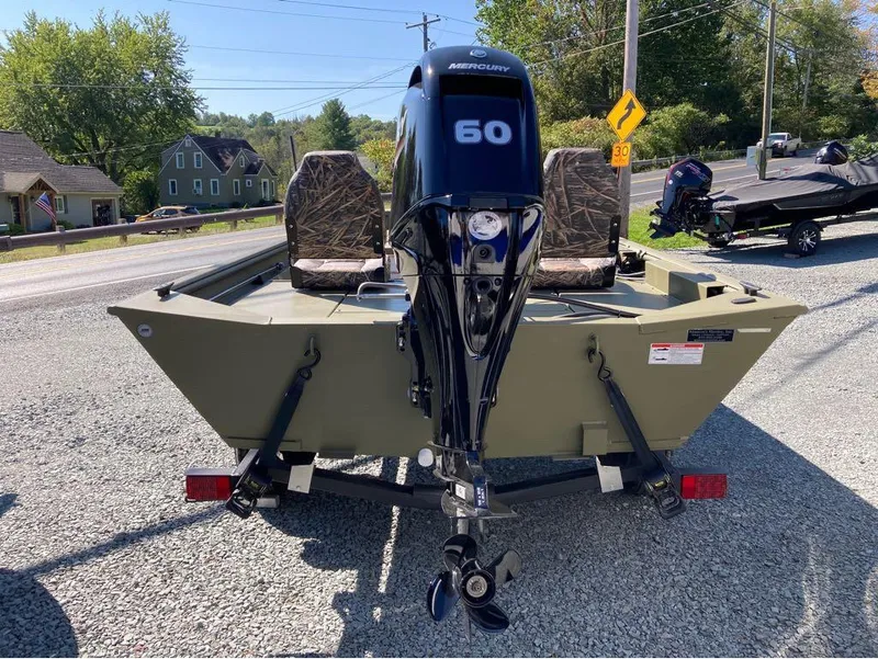 Slide: The Image of 2024 Lowe Roughneck RX1660 SC boat with Mercury 60 engine on gravel lot. - 5