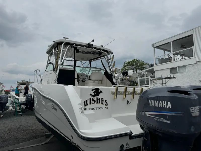 Slide: The Image of 2004 Seaswirl Striper 2901 Walkaround O/B boat with Yamaha outboard motor. - 10