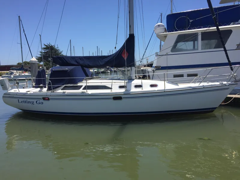 The Image of 2005 Catalina 34 Mk II sailboat docked in marina, named "Letting Go." - 0