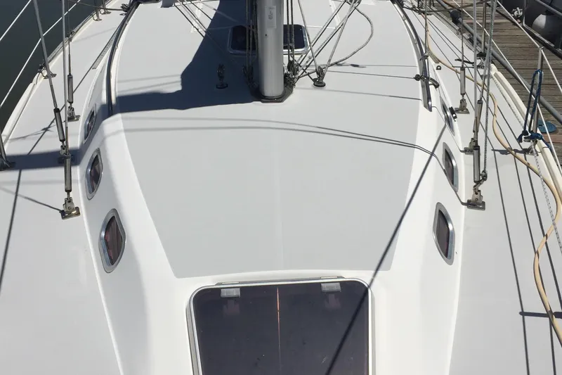 Slide: The Image of 2005 Catalina 34 Mk II sailboat deck with rigging and hatches. - 11