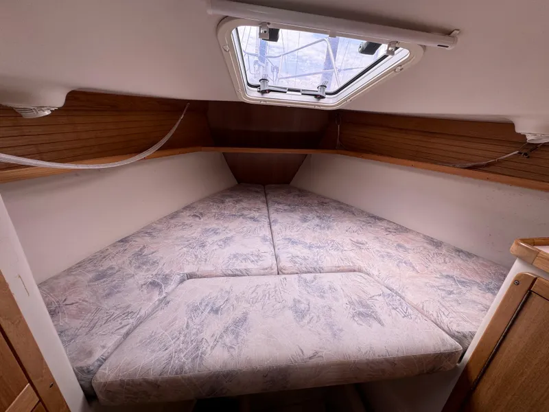 Slide: The Image of Interior cabin of 2005 Catalina 34 Mk II sailboat with a cozy V-berth. - 14