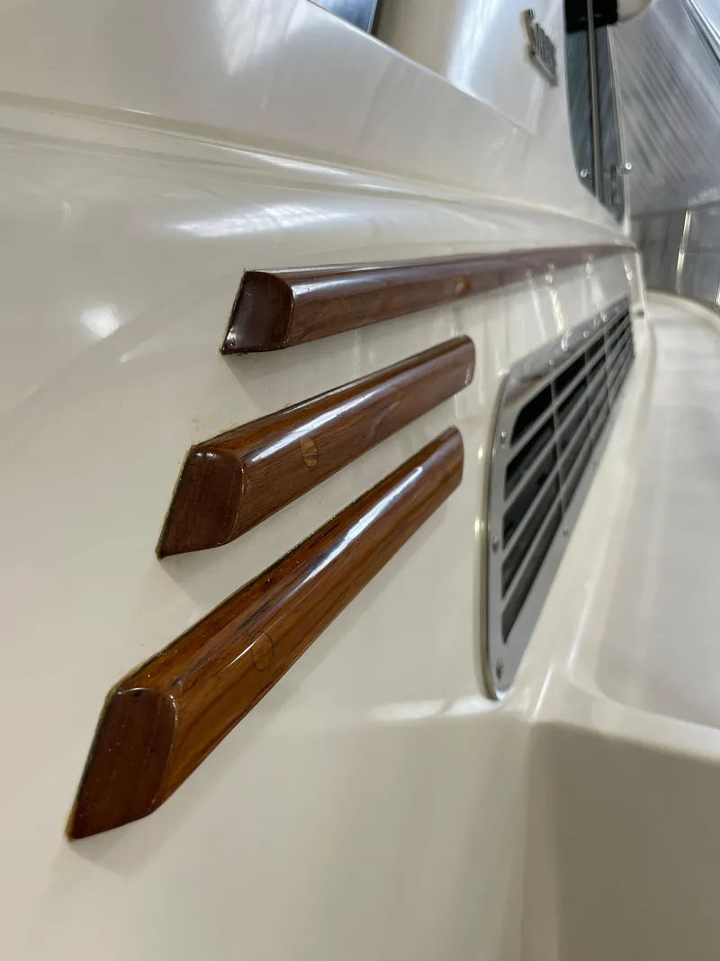 Slide: The Image of 2024 Sabre 43 Salon Express yacht with sleek wooden accents and modern design. - 39