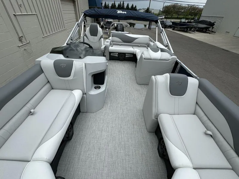 Slide: The Image of 2025 Tahoe LTZ 2385 VRB pontoon boat with luxurious seating and modern design. - 11