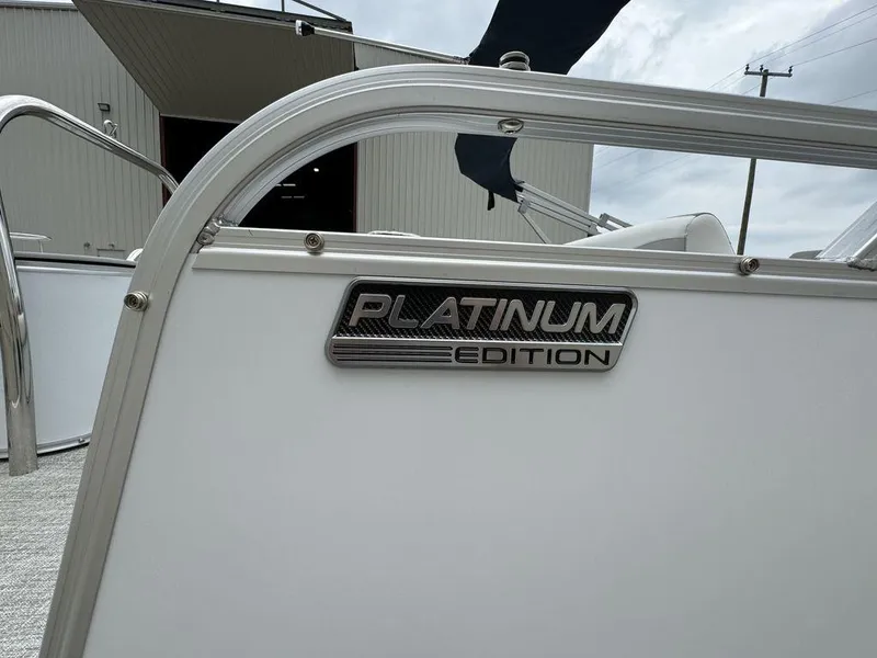 Slide: The Image of 2025 Tahoe LTZ 2385 VRB Platinum Edition boat detail with sleek design. - 13