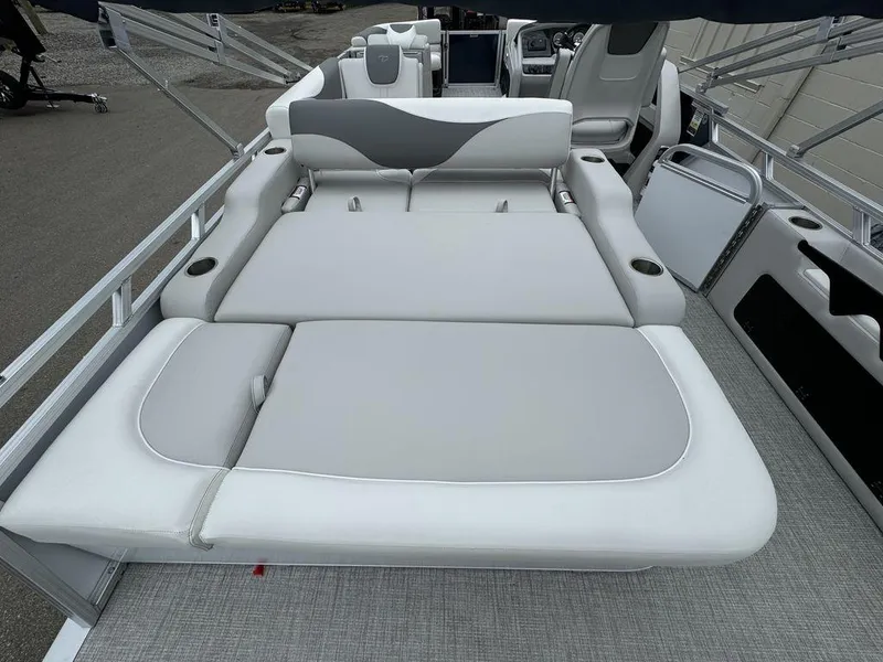 Slide: The Image of 2025 Tahoe LTZ 2385 VRB pontoon boat with spacious seating and modern design. - 3