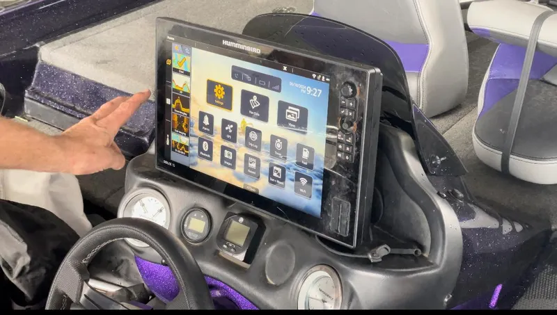 Slide: The Image of 2022 Phoenix 919 ProXP dashboard with Humminbird Solix 15 fishfinder and navigation system. - 11