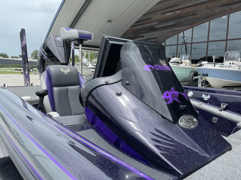 Slide: The Image of 2022 Phoenix 919 ProXP boat with custom graphics and sleek design. - 7