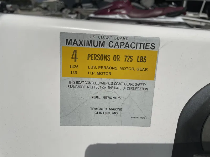 Slide: The Image of U.S. Coast Guard capacity label for 2006 Nitro NX 750 boat, 4 persons or 725 lbs. - 7